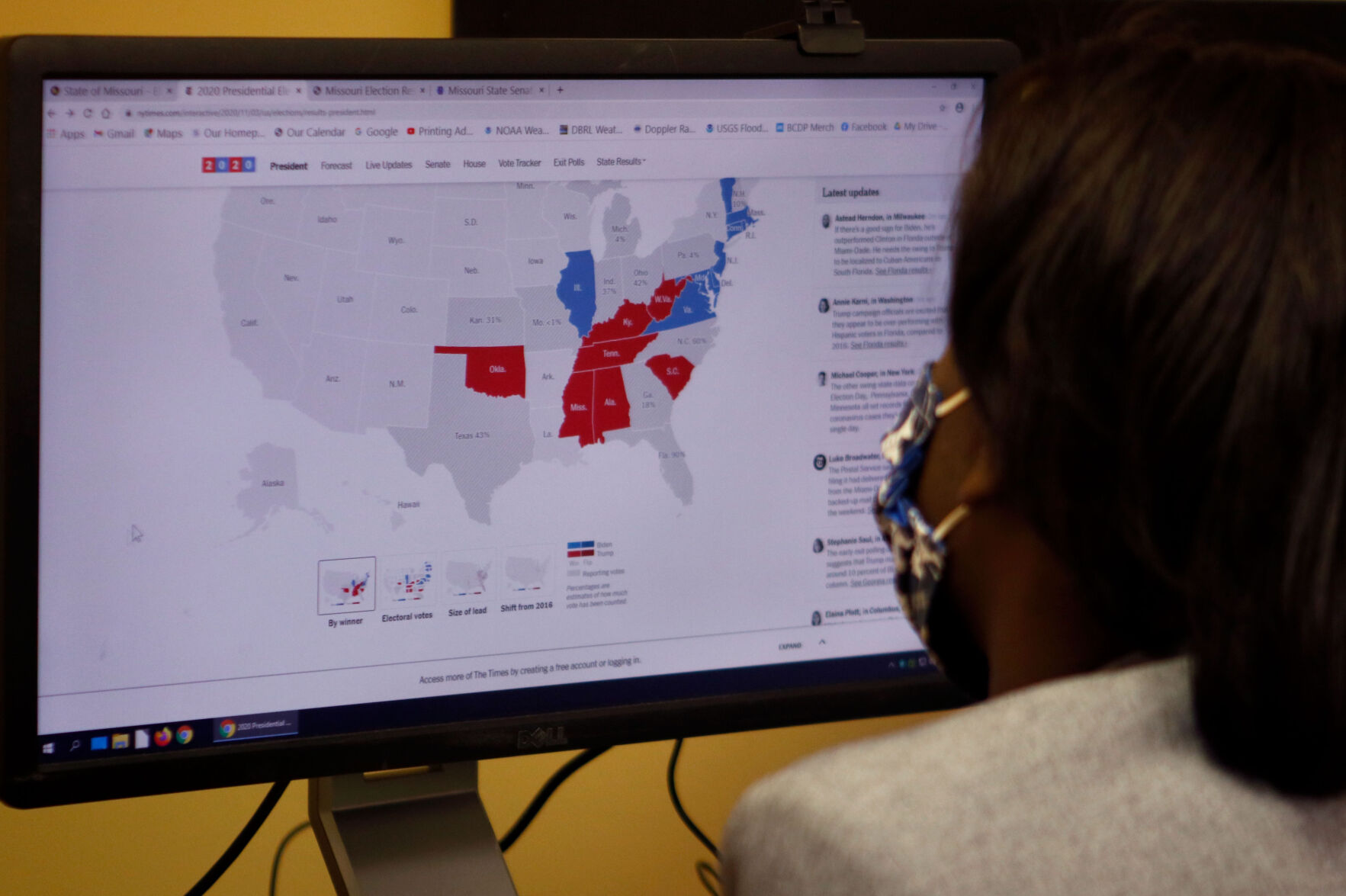 Kendall Martinez-Wright watches NPR’s online report of presidential election results